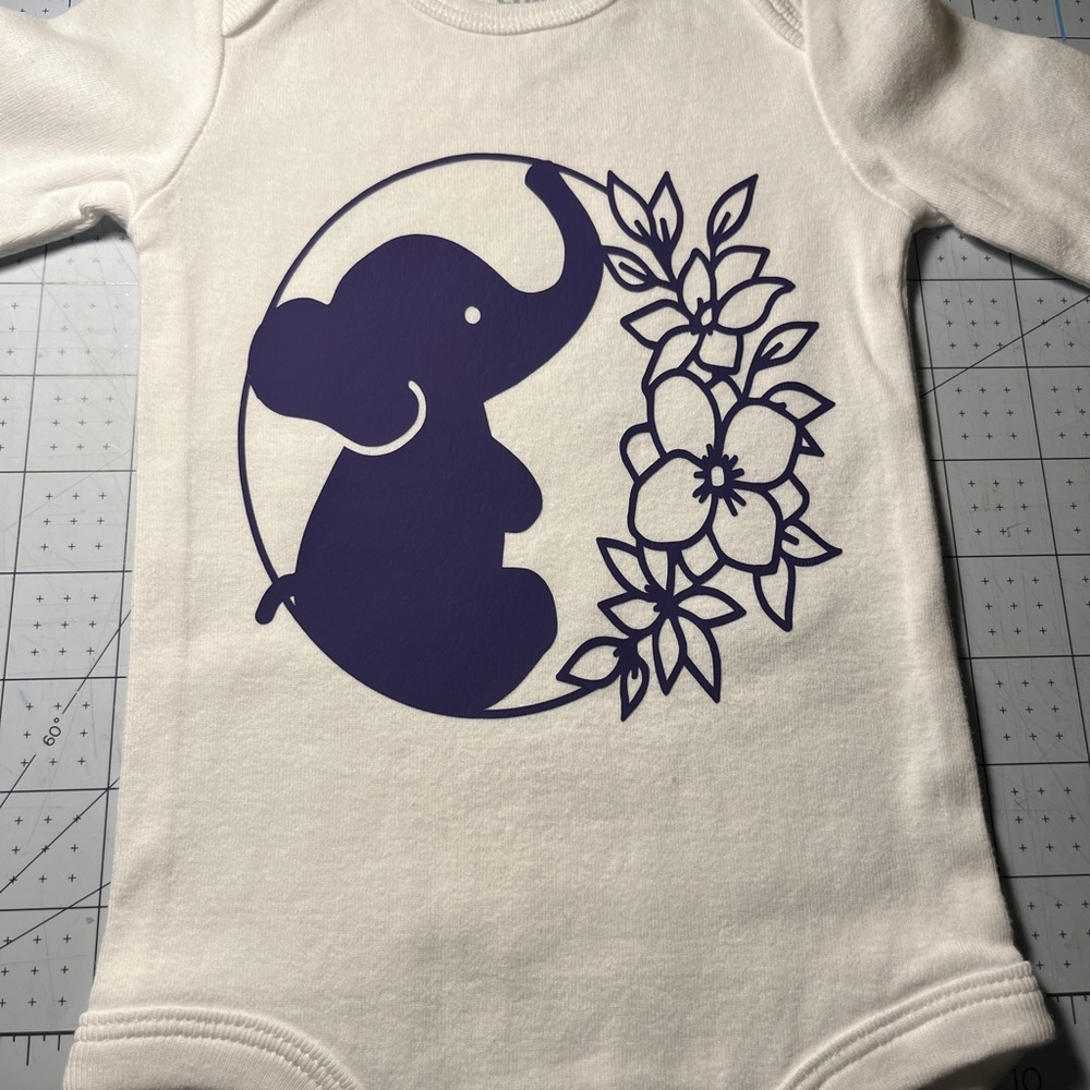 Carter’s homemade baby onesie. Long sleeved.